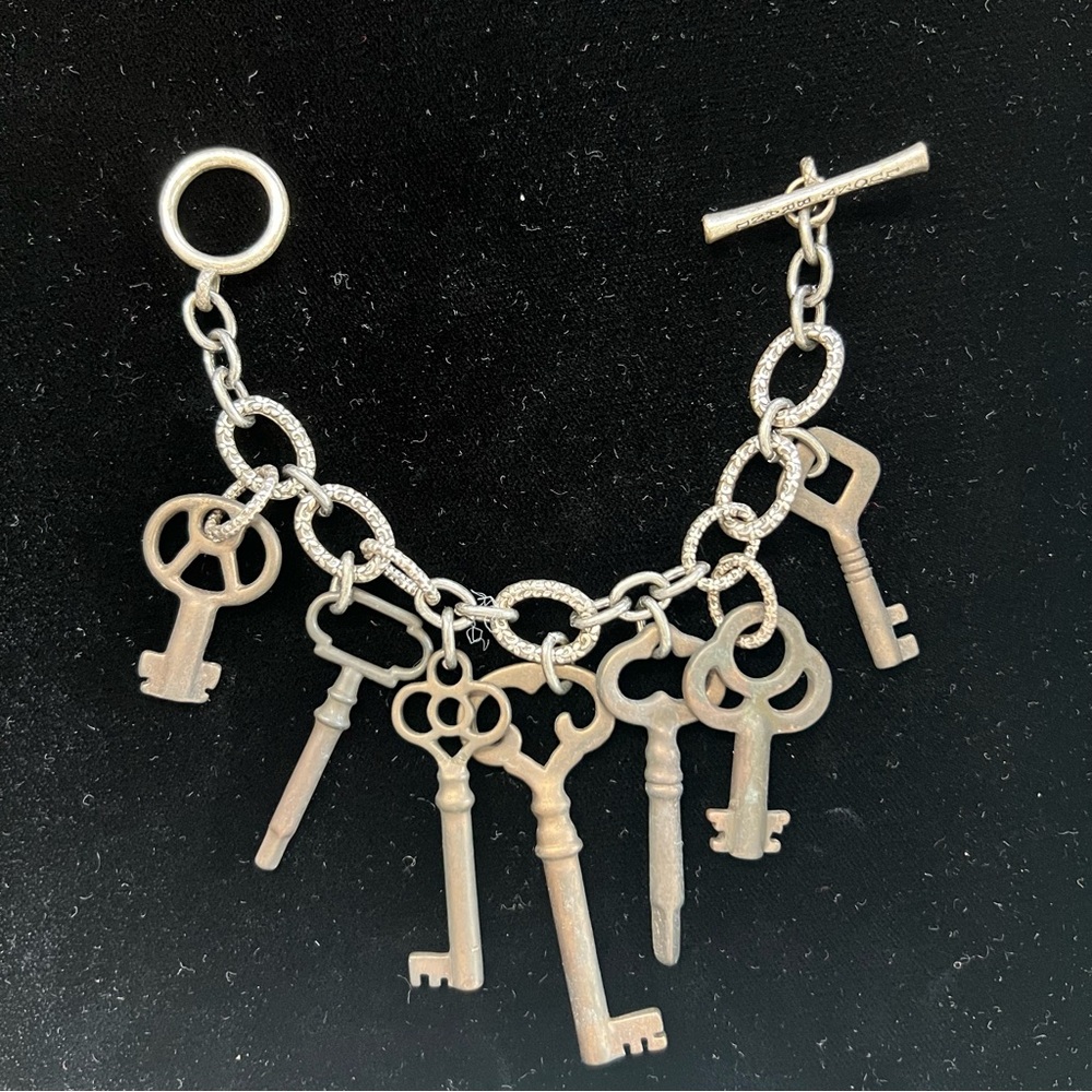 Lucky Brand Silver and Bronze Skeleton Key Charm Bracelet